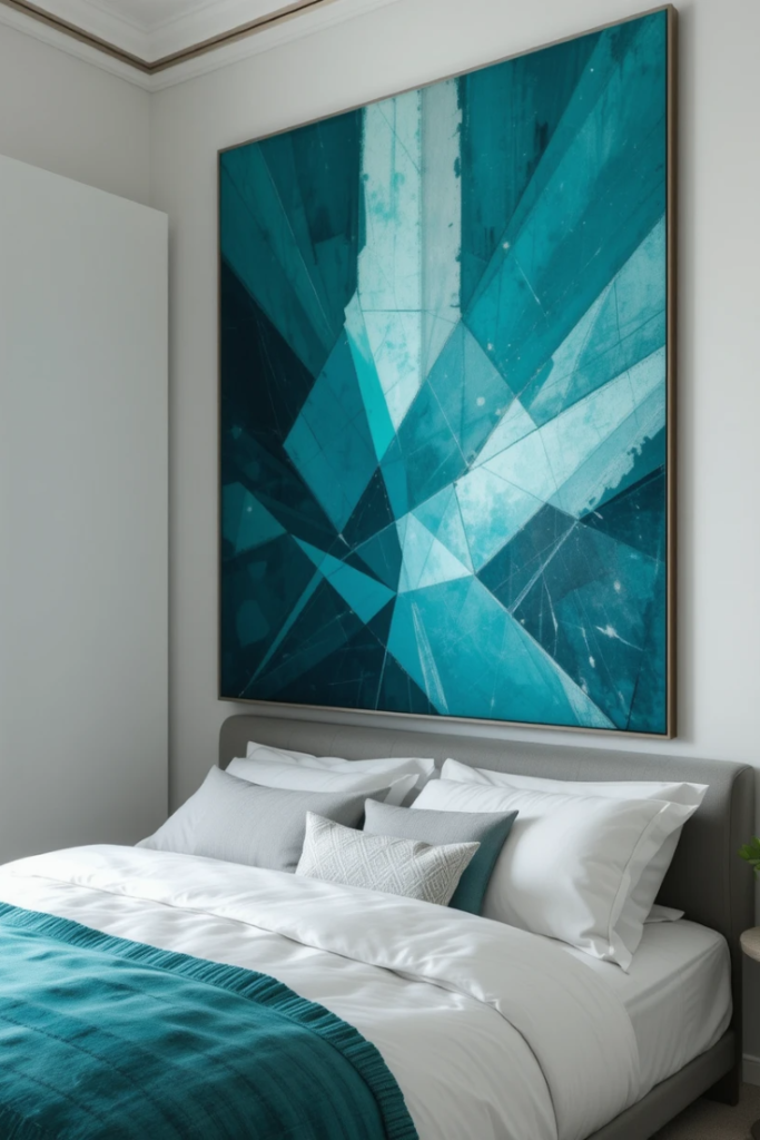 A modern bedroom with a large teal geometric wall art piece, neutral white walls, minimalist furniture, and soft lighting, creating a dynamic and artistic space.